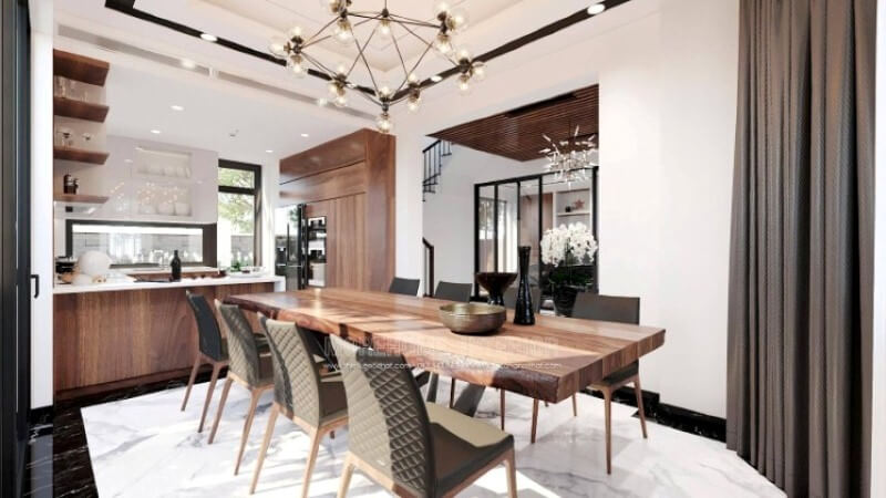 Sẽ là một gợi ý sáng tạo sẽ khiến bạn thích thú như trong ý tưởng thiết kế không gian bếp hiện đại biệt thự Vinhomes Imperia Hải Phòng trong đây, bố trí kệ trang trí ở vị trí gần bàn ăn nhất giúp bạn lấy ly, chén một cách dễ dàng.